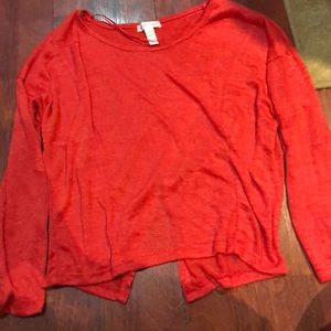 Cool orange tone long sleeve top with slit back